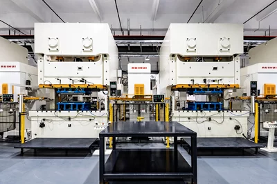 Planning of Tandem Stamping Lines with Gantry Transfer Manipulators  Press‑Layout Design